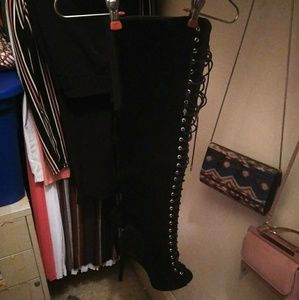 Black lace up over the knee high boot